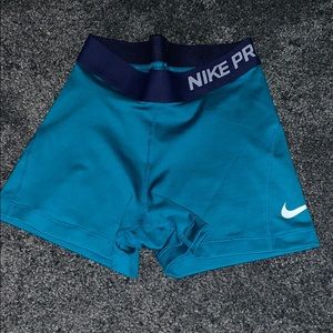 Teal Nike pros